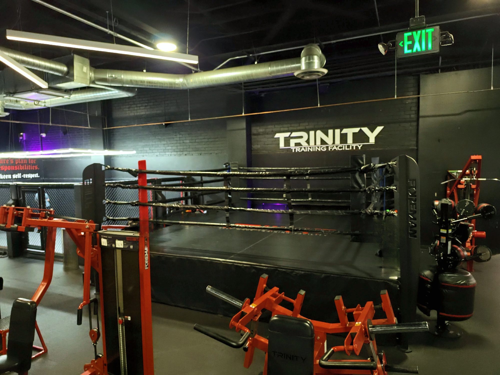 The boxing ring under the Trinity Training Facility sign